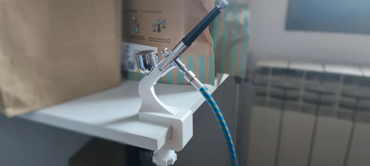 Suporte de mesa para pistola de tinta